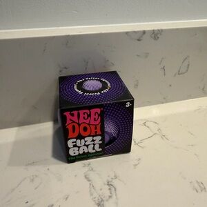 NeeDoh Fuzz Ball Purple Velvet Squeeze Toy